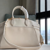  graceful top-handle bag detail view showing craftsmanship 26