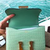 Side view of timeless structured handbag
