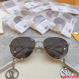 Lifestyle view of Louis Vuitton unisex sunglasses