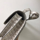Close-up detail of sculpted bag design