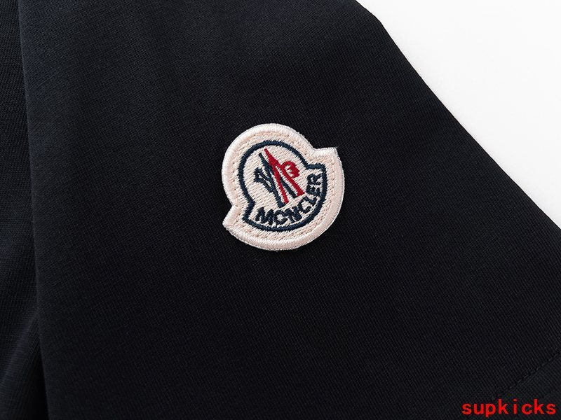 Front view of Moncler luxury clothing with monogram-inspired silhouette