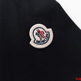 Front view of Moncler luxury clothing with monogram-inspired silhouette
