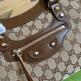 Styled lifestyle shot of modern chic women's handbag – women's designer-style accessory