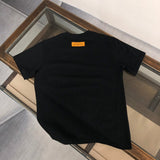 Close-up detail shot of Louis Vuitton cotton t-shirt with streetwear-inspired cut