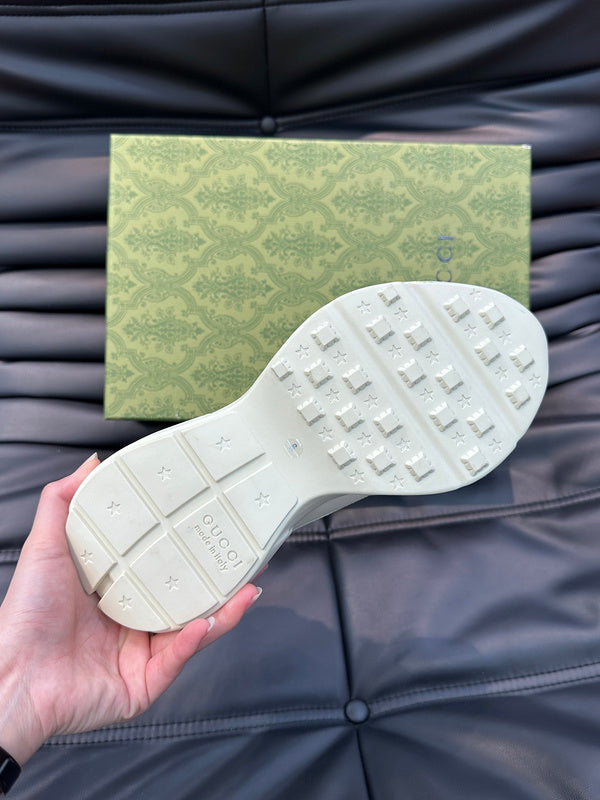 Side profile of Gucci crisp white sneakers cushioned comfort fit
