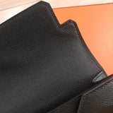 Side view of clean-lined structured handbag