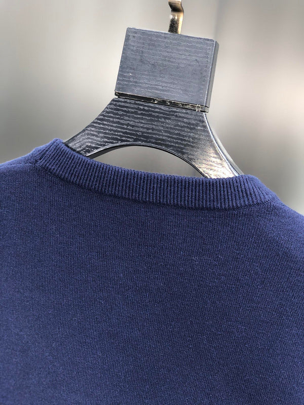 Side profile of Louis Vuitton luxury clothing with tailored silhouette