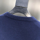 Side profile of Louis Vuitton luxury clothing with tailored silhouette