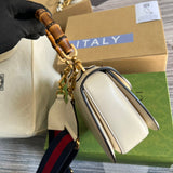 Handle and strap detail of chic signature women's handbag – women's statement bag