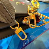 Styled lifestyle shot of structured signature women's handbag – women's statement bag
