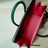 Side view of clean-lined structured handbag