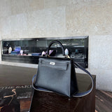 Side view of structured structured handbag