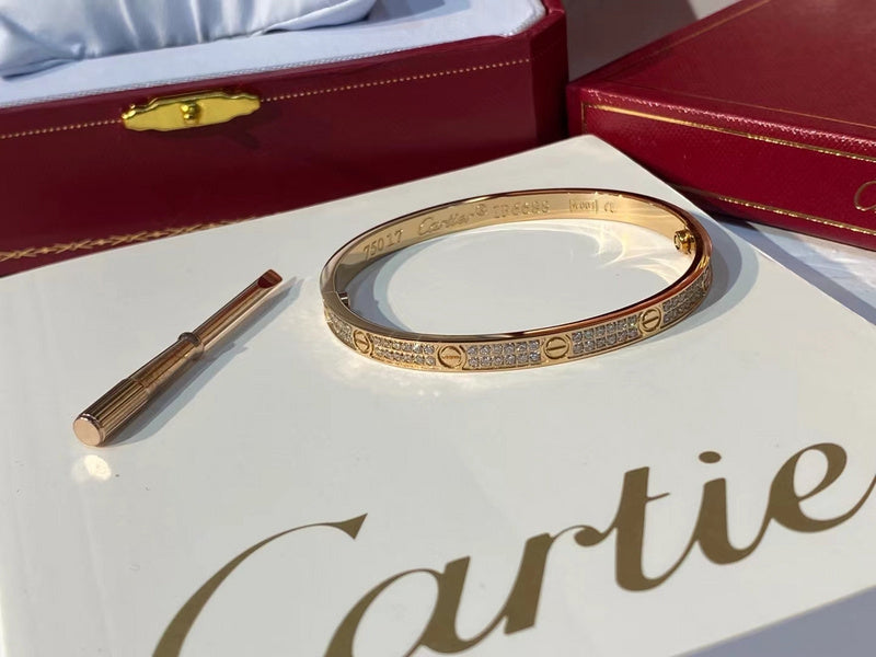 Side view of Cartier unisex jewelry piece