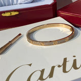 Side view of Cartier unisex jewelry piece
