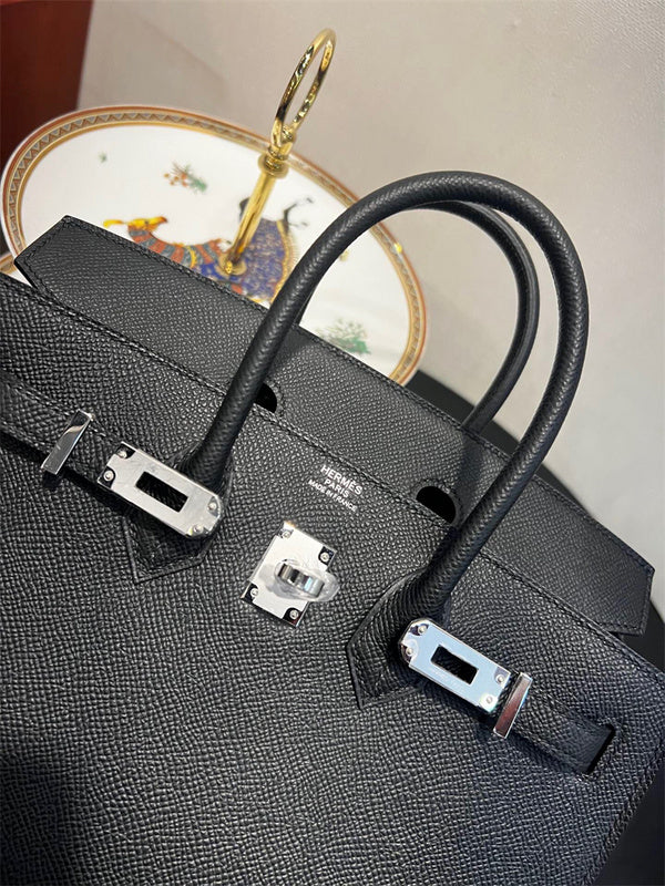 Side view of effortless structured handbag