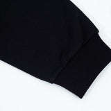 Side profile of Gucci luxury clothing with everyday silhouette