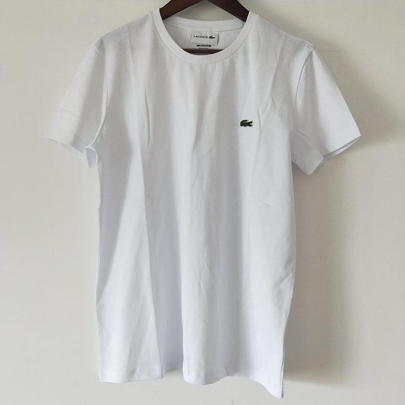 Full styled look of Lacoste luxury clothing with logo-detail design