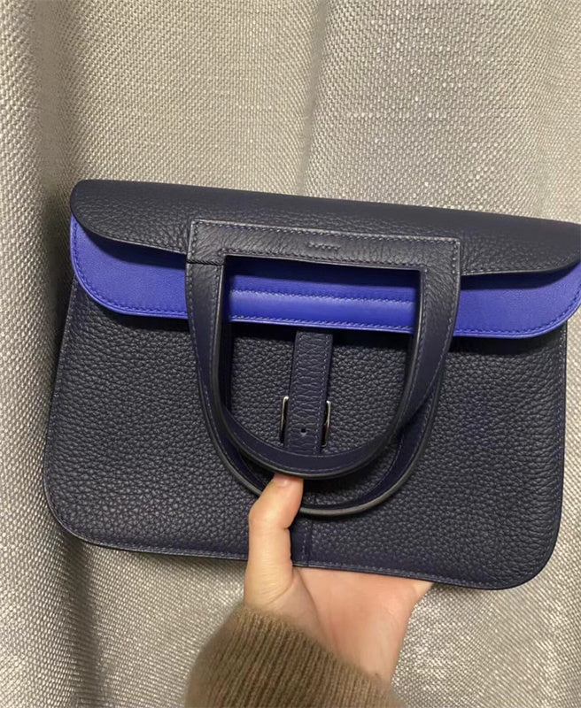  Streamlined shopper bag carried on shoulder 10