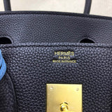 Side view of refined structured handbag