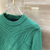 Close-up detail shot of Louis Vuitton luxury clothing with contemporary cut