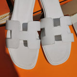 Hermes sandals Style 101 - angled studio shot