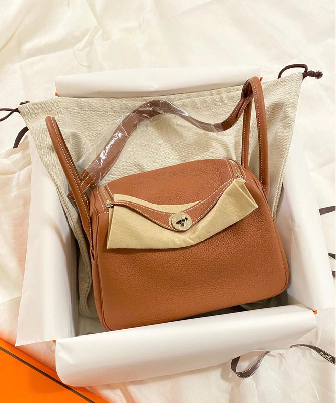 Side view of timeless structured handbag