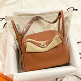 Side view of timeless structured handbag