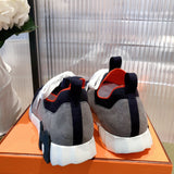 Hermès White High-Top Sneakers - Studio Shot