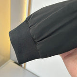 Back view of Louis Vuitton luxury clothing with label-forward styling