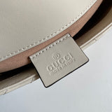 Side profile of sleek statement women's handbag – women's luxury handbag