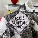 Flat lay presentation of Louis Vuitton luxury clothing with streetwear-inspired cut
