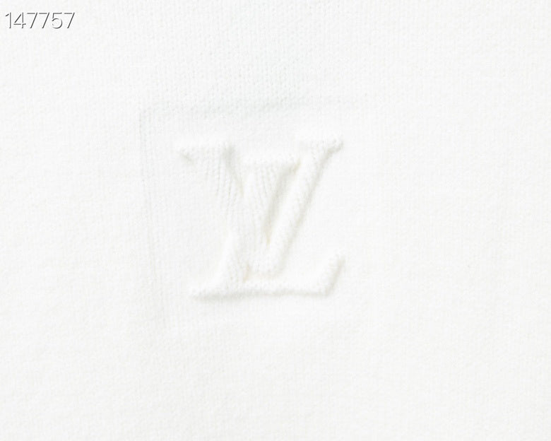 Full styled look of Louis Vuitton luxury clothing with signature branding