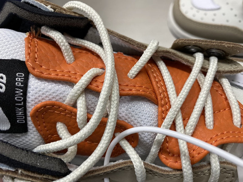 Side profile of Nike bold contrast sneakers signature lace-up style