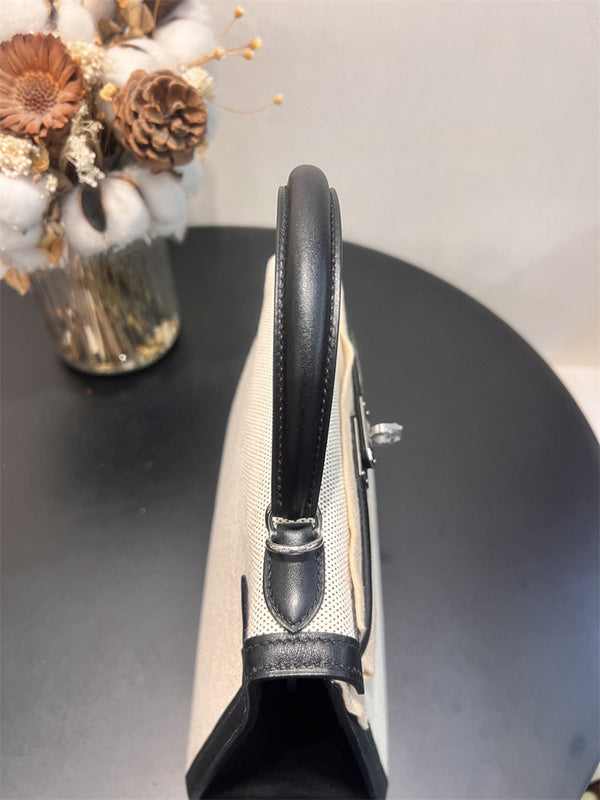 Side view of effortless structured handbag
