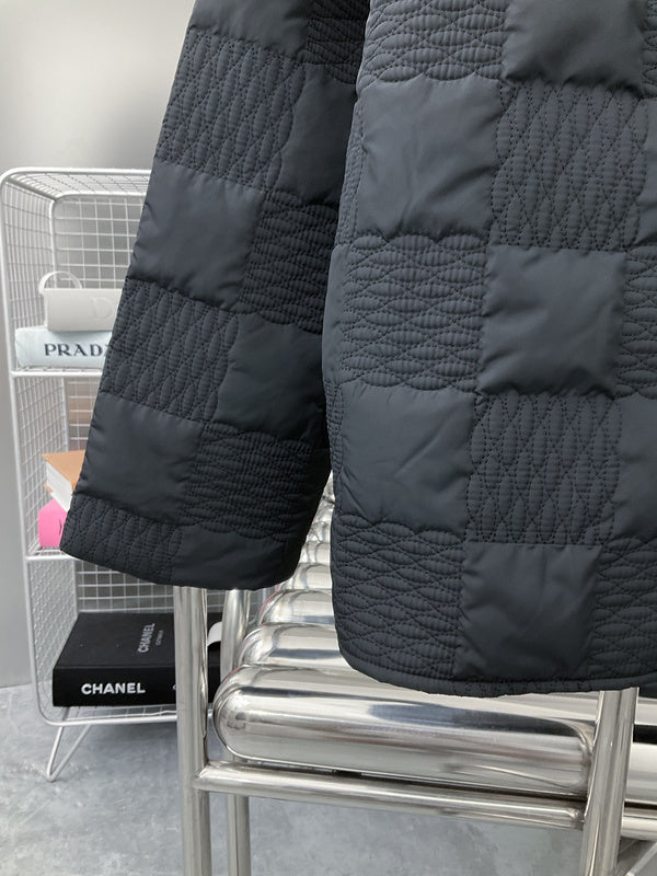 Back view of Louis Vuitton luxury clothing with label-forward styling