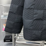 Back view of Louis Vuitton luxury clothing with label-forward styling