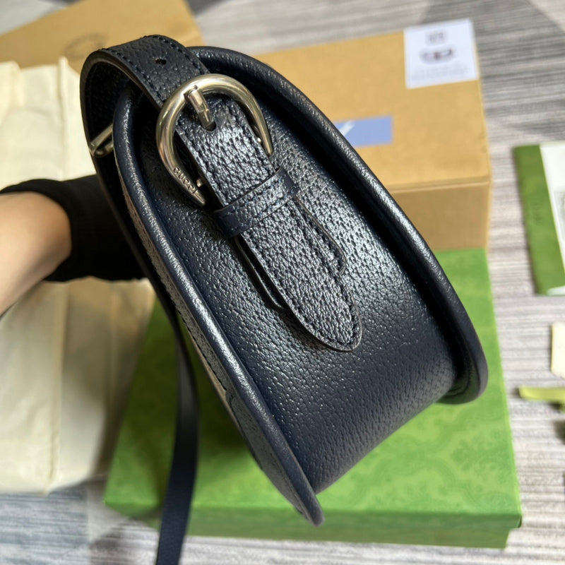 Handle and strap detail of refined sleek women's handbag – women's designer-style accessory