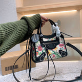 Ziva's Charm handbag – carry view (one versatile size)