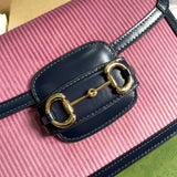 Back view of signature polished women's handbag – women's luxury accessory