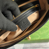 Side profile of signature everyday-luxe women's handbag – women's statement bag