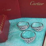 Close-up detail view of Cartier unisex jewelry piece