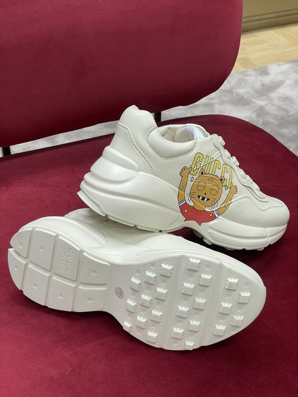 Side profile of Gucci soft grey sneakers premium leather build