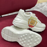 Side profile of Gucci soft grey sneakers premium leather build