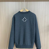 Side profile of Louis Vuitton luxury clothing with label-forward styling