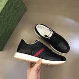Gucci Designer sneakers in muted earth tones retro runner design front view