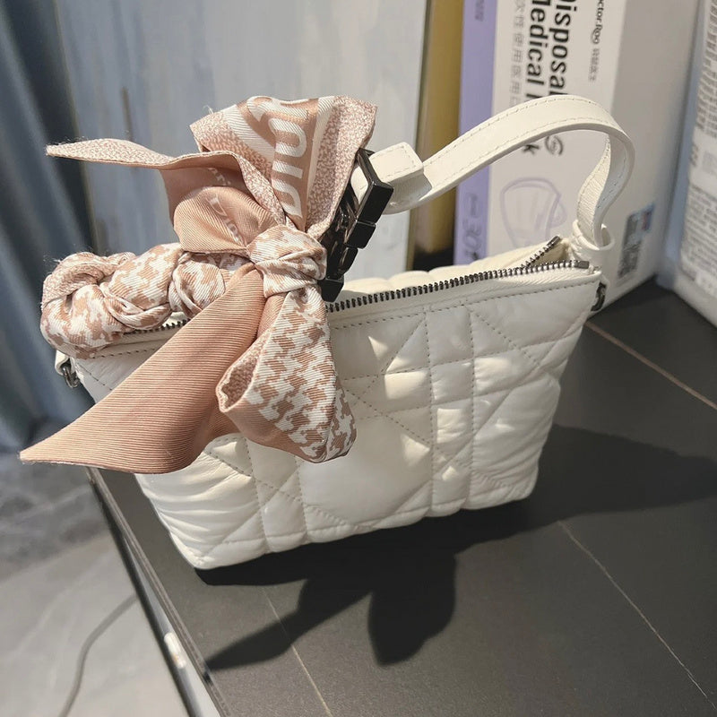 Side profile of elevated refined women's handbag – women's luxury handbag