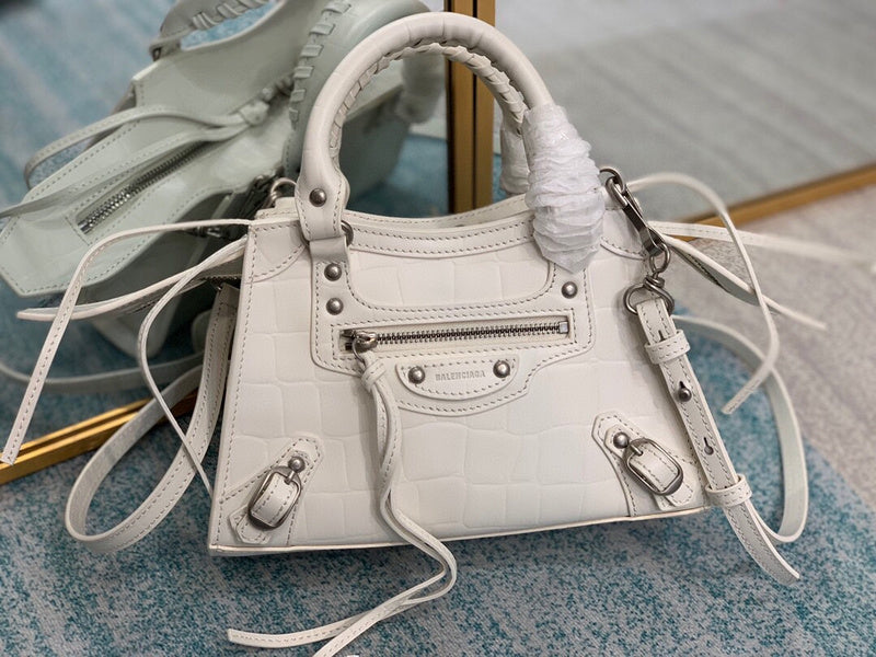 Understated Premium PU Leather Handbag - Statement Silhouette | Women's Premium Handbag #665 - front view (image 1) of designer-inspired handbag