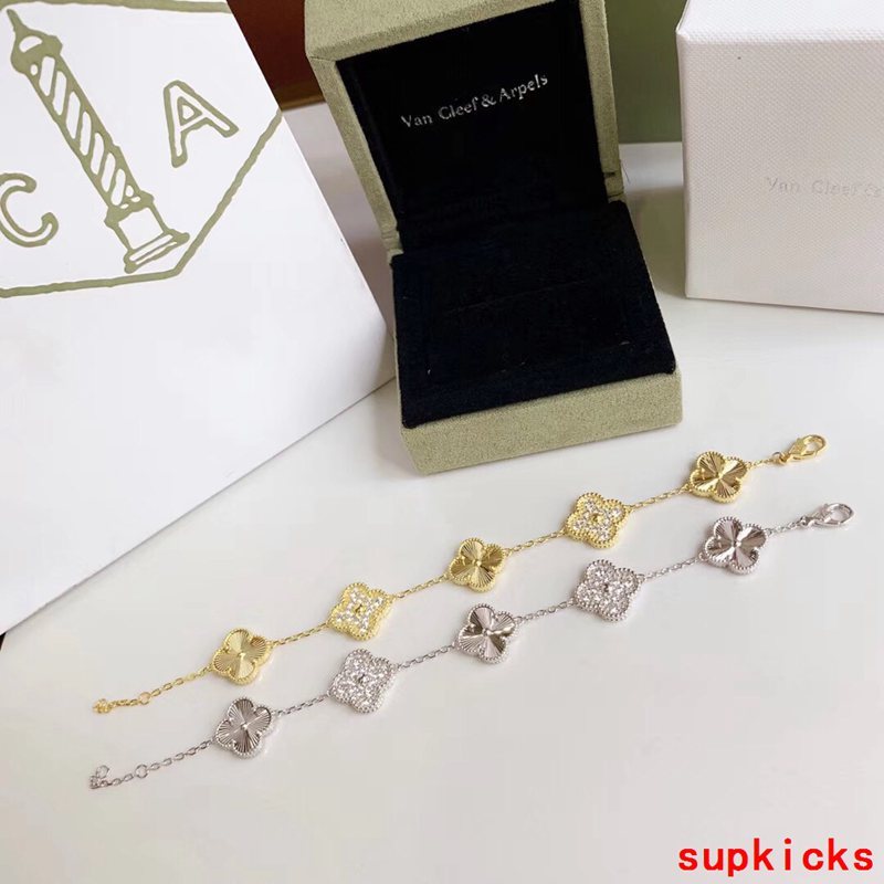 Lifestyle view of Van Cleef & Arpels unisex jewelry piece