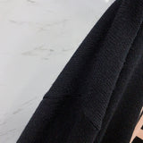 Balenciaga clothing close-up — premium authentic designer style