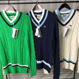 Front view of Lacoste luxury clothing with monogram-inspired silhouette